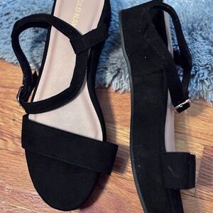 Elegant Black suede sandals.